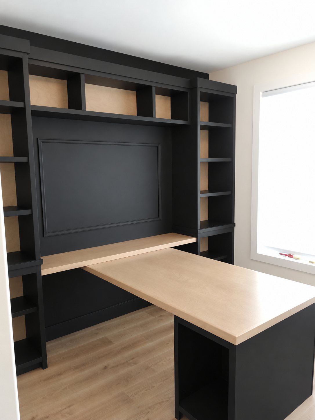 Custom charcoal built-in home office with wood desk by StairTrim Design